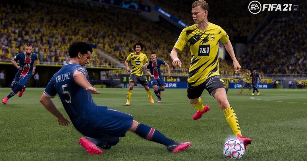 FIFA 21 player about to slide and steal the ball